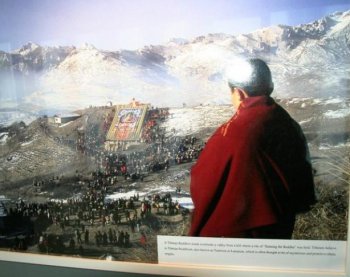 HARMONY IN TIBET? An image at the exhibit held at the U.N. on International Human Rights Day depicts a Tibetan Buddhist monk viewing a religious ritual. The Communist Party's purpose in displaying such imagery is to depict religious and ethnic harmony in Tibet, where human rights groups and Tibetans say that their religion has been attacked and undermined by the Party for over six decades. (UN Watch) HARMONY IN TIBET? An image at the exhibit held at the U.N. on International Human Rights Day depicts a Tibetan Buddhist monk viewing a religious ritual. The Communist Party's purpose in displaying such imagery is to depict religious and ethnic harmony in Tibet, where human rights groups and Tibetans say that their religion has been attacked and undermined by the Party for over six decades. (UN Watch)