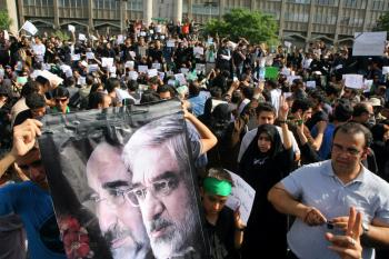 Iranian supporters of defeated reformist presidential candidate Mir Hossein Mousavi demonstrate on June 18 in Tehran, Iran. Former head of Israel's Mossad said that Mousavi is leading a real revolution that has far-reaching consequences. (Getty Images)