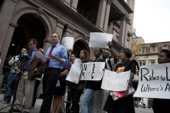 NO HIKES: Transit activists protest ahead of an MTA public hearing on Monday at the Cooper Union in East Village. (Henry Lam/The Epoch Times)