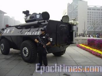 Armed police and armored vehicle on street of Beijing. (The Epoch Times) Armed police and armored vehicle on street of Beijing. (The Epoch Times)