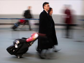 Newark Airport (EWR) passengers in Newark, New Jersey, last January. The airport reopened Monday morning after officials shut down part of its Terminal A for about an hour. (Chris Hondros/Getty Images)