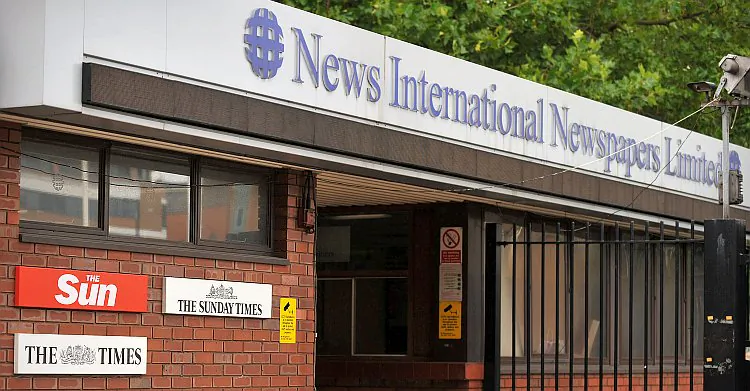 The company headquarters of News International, publisher of British national newspapers, in east London in this file photo from last year. News Corp., the parent company, is considering splitting itself into two companies: a publishing arm and an entertainment arm. (Ben Stansall/AFP/Getty Images)