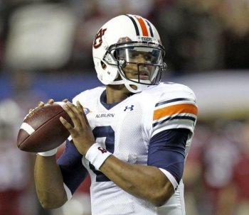 Auburn quarterback Cam Newton is enjoying one of the high points to his season with a birth in the National Championship game. (Mike Zarrilli/Getty Images) Auburn quarterback Cam Newton is enjoying one of the high points to his season with a birth in the National Championship game. (Mike Zarrilli/Getty Images)