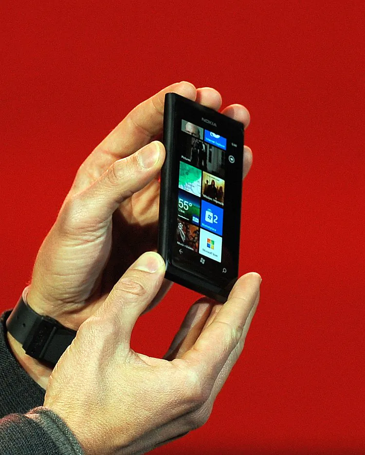 Host Ryan Seacrest displays the new Nokia Lumia 900 smartphone at the 2012 International Consumer Electronics Show on Jan. 09 in Las Vegas. (Kevork Djansezian/Getty Images)