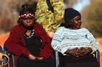 Aboriginal women gather for a meeting on July 6, 2007 at Mutitjulu, near Alice Springs. The Federal Government has restated its support for the Northern Territory intervention  in Indigenous communities. (Ian Walie/Getty Images)
