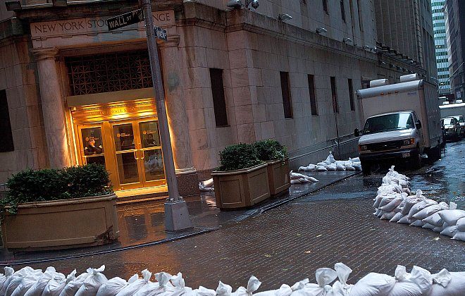 The New York Stock Exchange is seen surrounded with sand bags on Monday, Oct. 29 in New York City. U.S. equity markets were mostly closed Monday due to effects of Hurricane Sandy. (Andrew Burton/Getty Images)