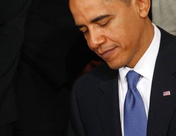 Barack Obama signs the Affordable Health Care for America Act during a ceremony with fellow Democrats in the East Room of the White House March 23 in Washington, D.C. Republicans maintain a clear position of repealing it. (Chip Somodevilla/Getty Images)
