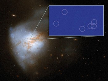 Galaxy Arp 220 (main image, taken with the Hubble Space Telescope) with some of its newly discovered supernovae (inset, taken with Global VLBI). The inset image is 250 light years across. (NASA, ESA, Hubble Heritage Team, Chalmers )