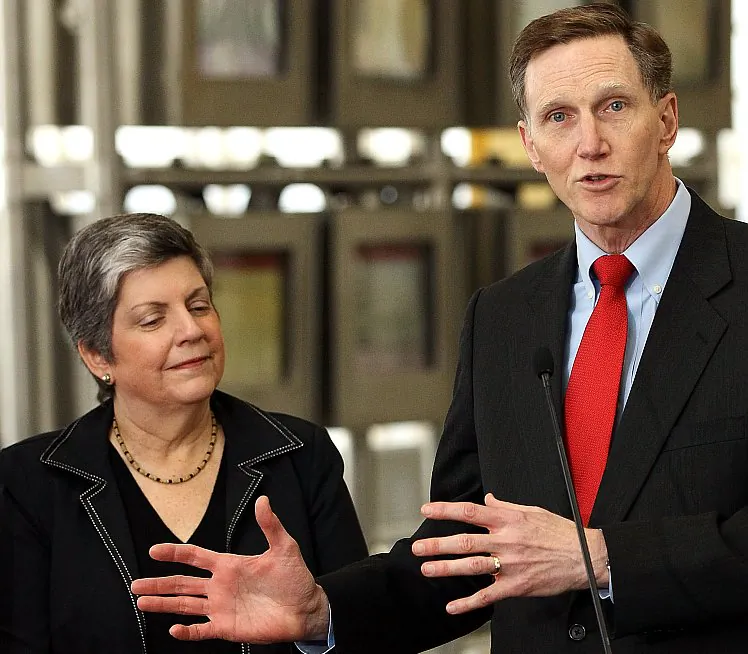 Transportation Security Administration (TSA) Administrator John Pistole (R) and Department of Homeland Security Secretary Janet Napolitano speak while announcing the expansion of TSA’s “Pre Check” passenger prescreening initiative at Reagan National Airport Feb. 8 in Arlington, Va. (Win McNamee/Getty Images)