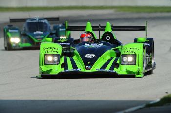 Patr&#243n Highcroft's Simon Pagenaud leads Lord Paul Drayson early in the ALMS Road America race. (Patr&#243n Highcroft Racing)