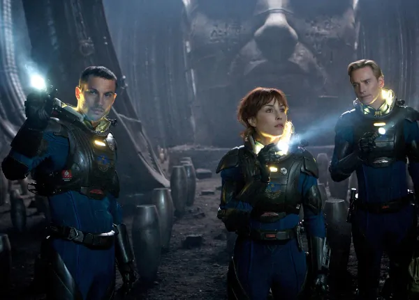 Logan Marshall-Green (L), Noomi Rapace, and Michael Fassbender explore a distant planet in the science fiction action-horror film “Prometheus.” (Kerry Brown/TM and Twentieth Century Fox Film Corporation)