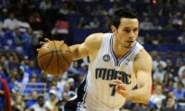 Redick and Howard Lead Magic Past Jazz