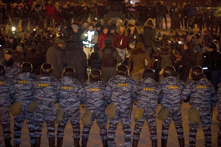 Russian riot police close in on hundreds of opposition activists at Moscow’s Pushkin Square on March 5. (John MacDougall/AFP/Getty Images)