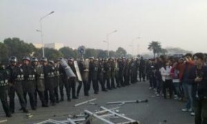Riot Police and Strikers Clash at Jiangsu Manufacturing Plant
