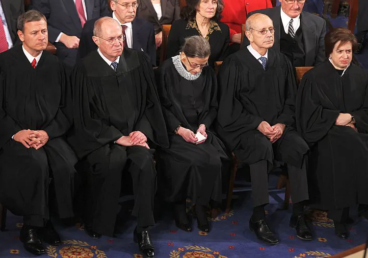 Chief Justice John G. Roberts Jr., Associate Justice Anthony M. Kennedy, Associate Justice Ruth Bader Ginsburg, Supreme Court Justice Stephen Breyer, and Associate Justice Elena Kagan at the State of the Union speech on Jan. 24 in Washington. (Alex Wong/Getty Images)