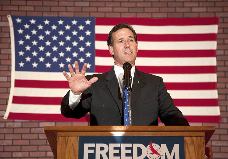 Republican presidential candidate, former U.S. Sen. Rick Santorum speaks to supporters at a Rally for Rick, at Ledgeview Bowling Lanes on March 25, in Fond du Lac, Wis. Santorum is back on the campaign trail following a decisive victory in Louisiana's GOP primary election. (Mark Hirsch/Getty Images)