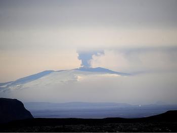 Ash and smoke bellow from the Eyjafjallaj&#246kull volcano as the volcano is seen from Vestmannaeyjar, Iceland, on April 20, 2010. (Emmanuel Dunand/AFP/Getty Images)