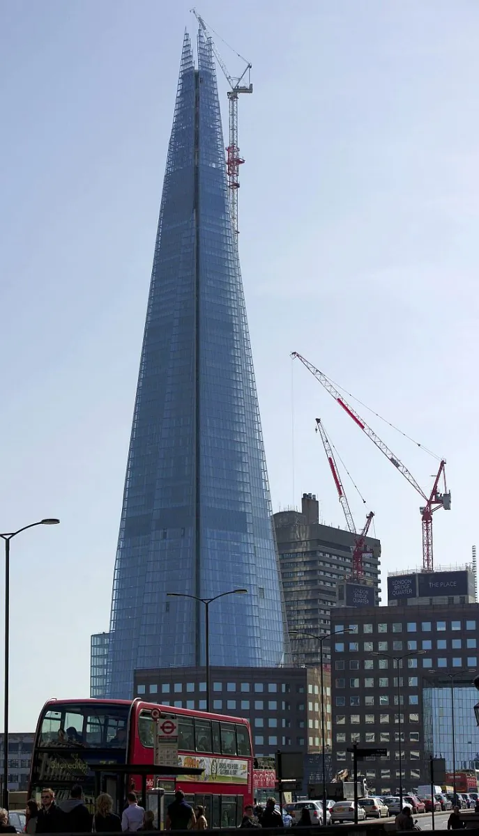 The Shard, the European Union's tallest building, is shown under construction in the center of London on April 1. The enormous glass-clad structure, which will comprise a total of 95 floors, is already winning critical acclaim for its architect Renzo Piano. (Carl Court/AFP/Getty Images)