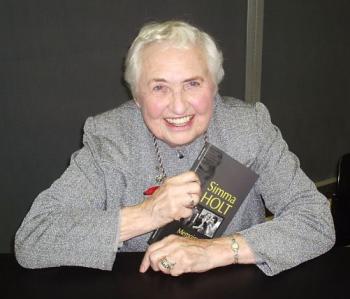 Simma Holt holds a copy of her new book, Memoirs of a Loose Cannon, at her book launch on November 6 at Library and Archives Canada in Ottawa. (Cindy Chan/The Epoch Times) Simma Holt holds a copy of her new book, Memoirs of a Loose Cannon, at her book launch on November 6 at Library and Archives Canada in Ottawa. (Cindy Chan/The Epoch Times)