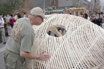 COCOON: A man peers into Sukkah City entry titled 'Star Cocoon' on Union Square on Sunday, Sept. 19. Star Cocoon was submitted by Vulkan Alkanoglu of Los Angles CA. (Tim McDevitt/The Epoch Times) COCOON: A man peers into Sukkah City entry titled 'Star Cocoon' on Union Square on Sunday, Sept. 19. Star Cocoon was submitted by Vulkan Alkanoglu of Los Angles CA. (Tim McDevitt/The Epoch Times)