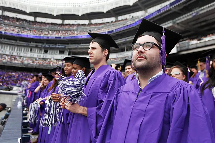 Graduating students attend New York University's commencement ceremony at Yankee Stadium on May 16 in the Bronx, New York City. (Mario Tama/Getty Images)