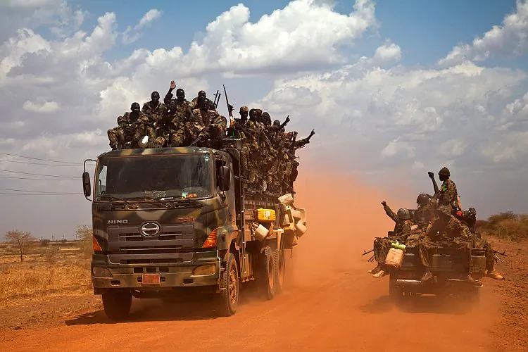South Sudanese soldiers are seen near Heglig in Sudan, on April 17. The southern army now controls both the town of Heglig and the Heglig oil fields as violence along the border between the neighbors inches closer to full-scale war. (Adriane Ohanesian/AFP/Getty Images)