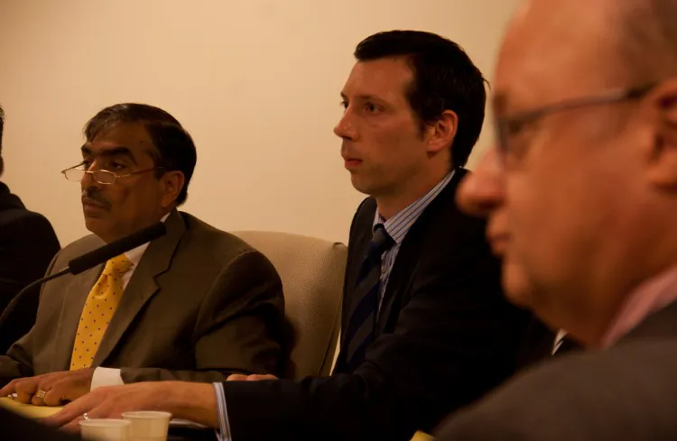 (From L to R) Rahul Merchant, Department of Information, Technology, and Telecommunications commissioner; Brett Robinson, deputy commissioner for financial management and administration; and general counsel Charles Fraser, at a City Council Executive Budget Hearing on Tuesday. (Zachary Stieber/The Epoch Times)