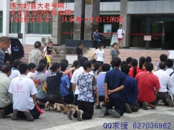 Families appeal on their knees outside the town government building. The caption reads 'Mighty County officials, please take care of us civilians! We are so insignificant, but all we want is our own homes!' (Provided by the appellant) Families appeal on their knees outside the town government building. The caption reads 'Mighty County officials, please take care of us civilians! We are so insignificant, but all we want is our own homes!' (Provided by the appellant)
