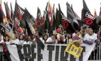 Tibetans March for 50th Anniversary of Uprising