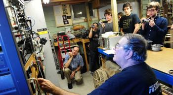 FUSIONEER: Richard Hull, turns on his homemade fusion reactor while others observe. (Richard Hull) FUSIONEER: Richard Hull, turns on his homemade fusion reactor while others observe. (Richard Hull)