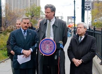 NO TOLL: (Pictured from left to right)Council Member David Weprin, Council Member Bill DiBlasio, and Brooklyn Borough President Marty Markowitz, stand at the foot of the Brooklyn Bridge to oppose possible toll.  (JOSHUA PHILIPP/THE EPOCH TIMES)