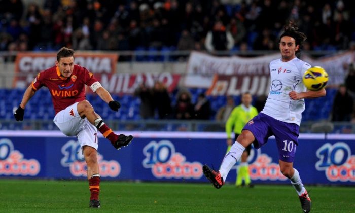 AS Roma forward Francesco Totti scores against Fiorentina in Saturday’s Serie A action at the Stadio Olimpico. (Tiziana Fabi/AFP/Getty Images)