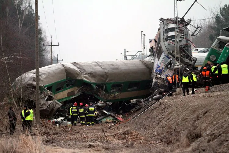 Rescuers work at the scene of a train crash in Szczekociny near Zawiercie (Silesia) in Poland, on March 4. Two passenger trains collided on March 3,  killing at least 15 people and injuring another 59. An investigation into the crash was launched on Sunday. (Jacek Bednarczyk/AFP/Getty Images)