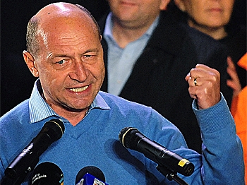 WINNER: Romania incumbent President Traian Basescu addresses supporters at Democratic-Liberal Party's headquarters after declaring himself the winner on Dec. 6 in Bucharest. (Daniel Mihailescu/AFP/Getty Images)