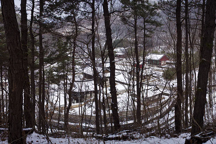 Uam Historical Park in Daejeon as seen from a forested hillside on a snowy morning. December 22, 2012. (Jarrod Hall/The Epoch Times)