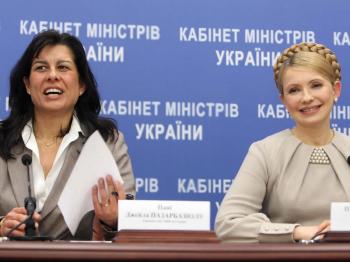 Prime Minister of Ukraine Yulia Tymoshenko (R) and Ceyla Pazarbasioglu, International Monetary Fund (IMF) mission chief to the Ukraine, smile during their press-conference in Kiev on April 17, 2009. (Alexander Prokopenko/AFP/Getty Images)