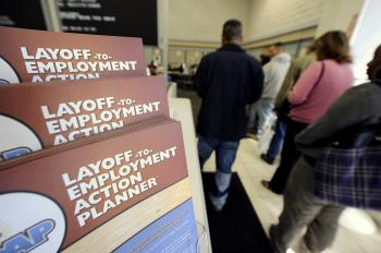 An unemployment benefits extension will not apply for Nevadans that have exhausted benefits. Above, job-seekers wait in line for assistance at a government-run employment center, in Las Vegas, Nevada on Nov. 9. (ROBYN BECK/AFP/Getty Images)