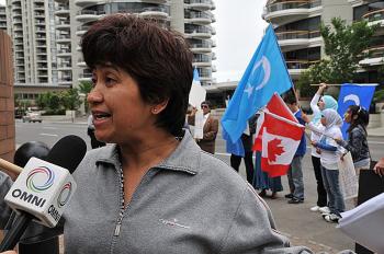 Ms. Mukerrem Kurban, the spokesperson for the protest in Calgary, Canada. (Wu Weilin/The Epoch Times) Ms. Mukerrem Kurban, the spokesperson for the protest in Calgary, Canada. (Wu Weilin/The Epoch Times)