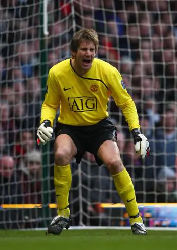 MR. CLEAN: Manchester United’s goalkeeper Edwin van der Sar holds the record with 13 consecutive clean sheets in the Premier League. ( Richard Heathcote/Getty Images)