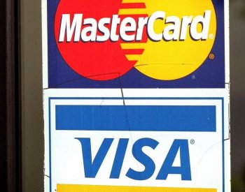 Visa and Mastercard settled an antitrust suit with the US Department of Justice on Monday. (Tim Boyle/Getty Images)