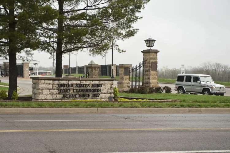 A vehicle leaves from the main entrance to the U.S. Army's Fort Leavenworth March 22, in Leavenworth, Kansas. Army Staff Sgt. Robert Bales, accused of a shooting rampage that killed 16 people in Afghanistan, is being held at the military prison at Fort Leavenworth. (Photo by Julie Denesha/Getty Images)