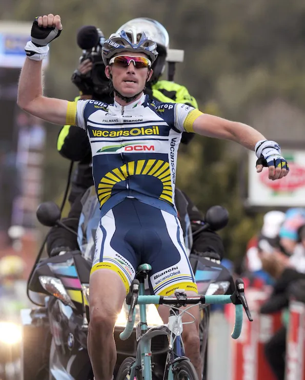 Vacansoleil’s Liuwe Westra punches the air with pride as he crosses the line to win Stage Five of the Paris-Nice cycling race. (Pascal Pavani/AFP/Getty Images)