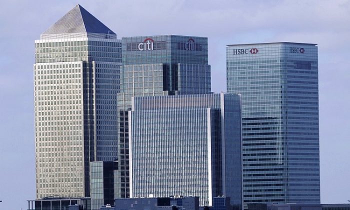 The photo shows a view of Canary Wharf, including the headquarters of British banks Barclays (L) and HSBC (R), in east London, Sept. 12. Canary Wharf is London's main financial center where many banks have established offices. (Facundo Arrizabalaga/AFP/Getty Images)