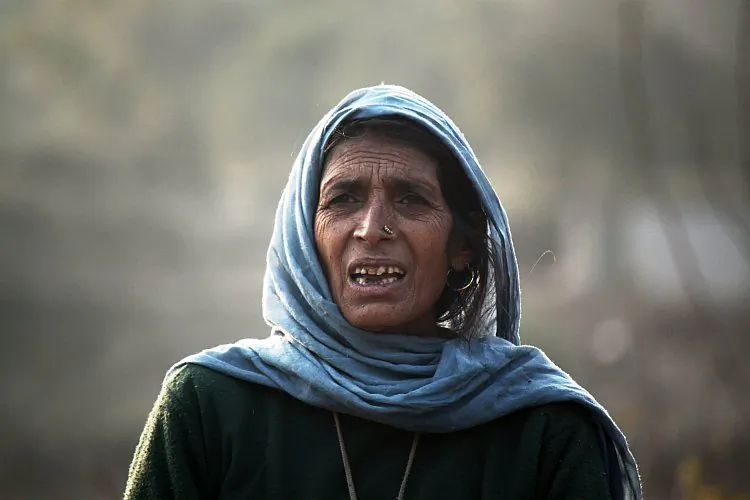 A woman on the mountainous borders of the Northern Indian state of Jammu and Kashmir. (Venus Upadhayaya/The Epoch Times)