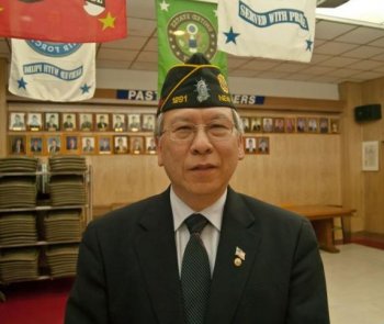 SUPPORTING VETERANS: Fang Wong stands for a photo at the American Legion Lt. B. R. Kimlau Chinese Memorial Post in New York City. Wong is a leading candidate to become the next American Legion National Commander. (Joshua Philipp/The Epoch Times)