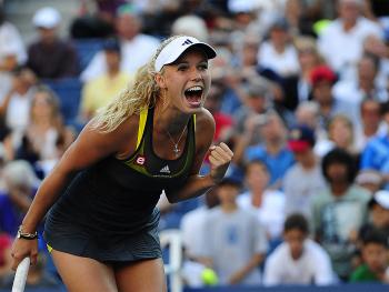 PASSED THE TEST: Caroline Wozniacki bested Maria Sharapova in two tough sets at the U.S. Open on Monday. (Emmanuel Dunand/AFP/Getty Images)