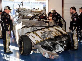 Crew chief Tony Gibson (R) looks over the #39 U.S Army Chevrolet, driven by Ryan Newman after the first big wreck in the AMP Energy 500 at Talladega Superspeedway. (Rusty Jarrett/Getty Images for NASCAR) Crew chief Tony Gibson (R) looks over the #39 U.S Army Chevrolet, driven by Ryan Newman after the first big wreck in the AMP Energy 500 at Talladega Superspeedway. (Rusty Jarrett/Getty Images for NASCAR)