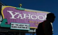 Yahoo Reports Fourth-Quarter Loss as Yang Exits