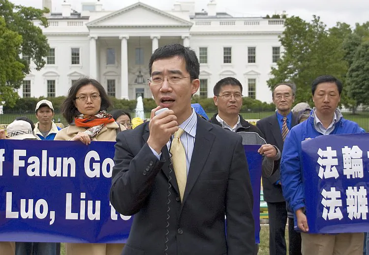 Jared Pearman, Falun Dafa Information Center representative spoke in front of the White House on April 23, at a news conference on the 13th anniversary of the protest in Beijing of April 25, when the regime was shocked at the support for Falun Gong. (Gary Feuerberg/ The Epoch Times)