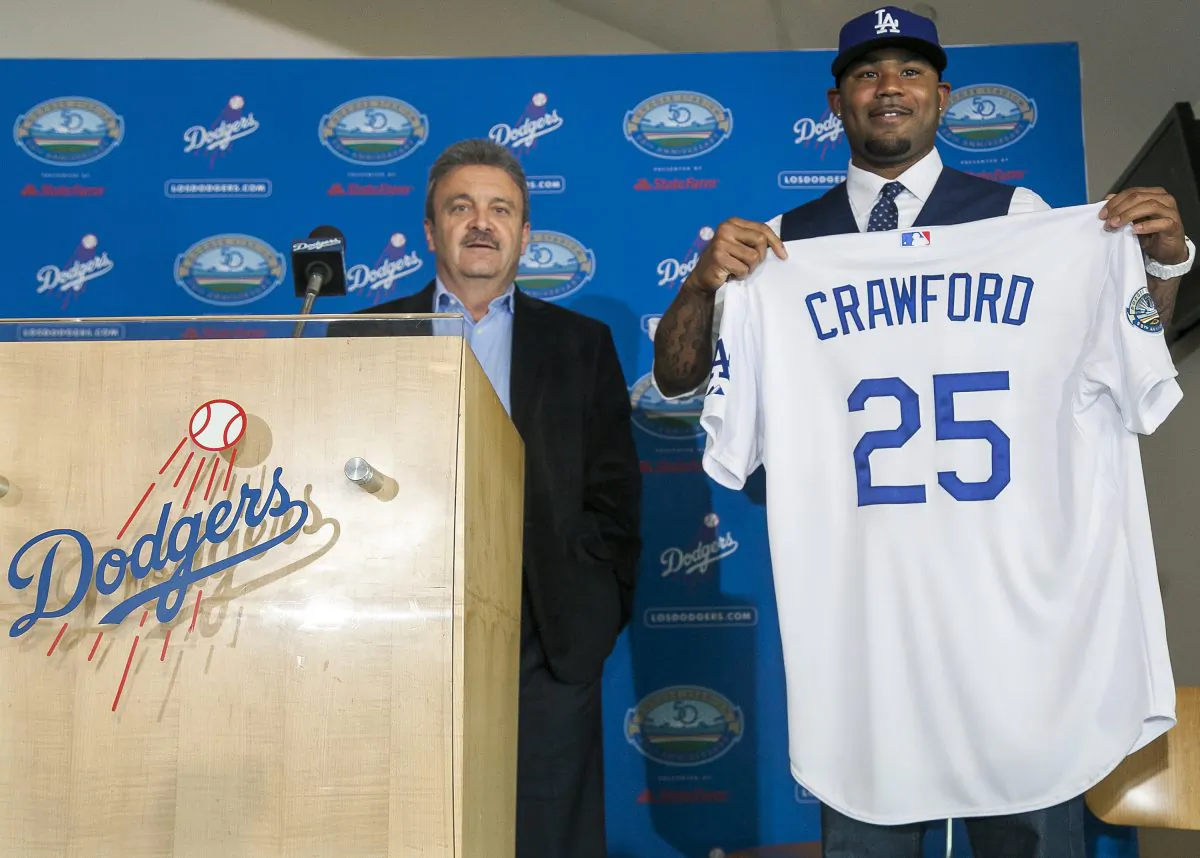 Carl Crawford was one of three big-name players traded three years ago from the Red Sox to the Dodgers in an August deal. (AP Photo/Damian Dovarganes) 